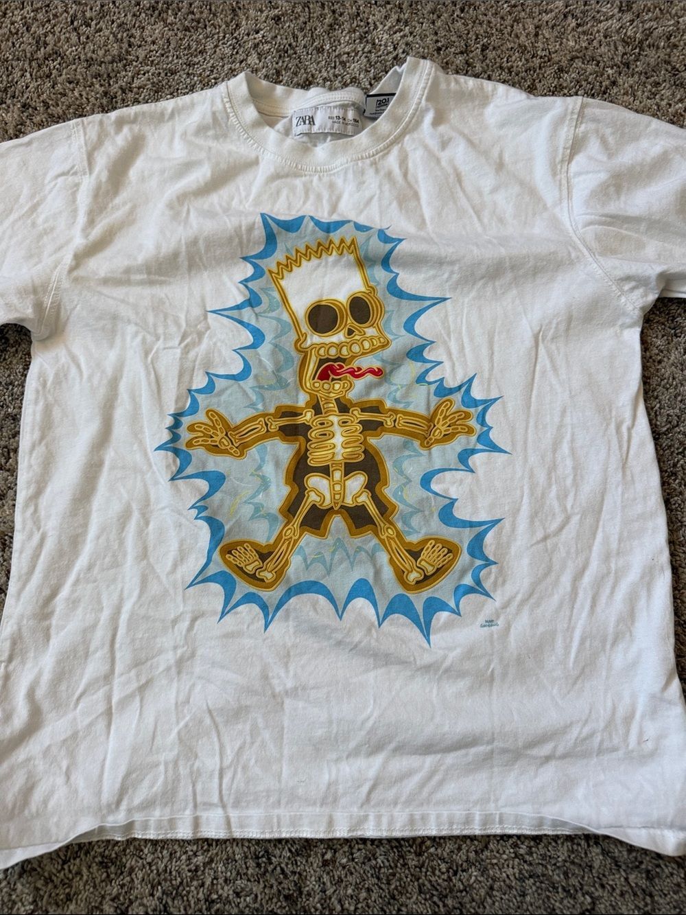 Zara White Kids Tee with Yellow Skeleton Graphic and Blue Accent